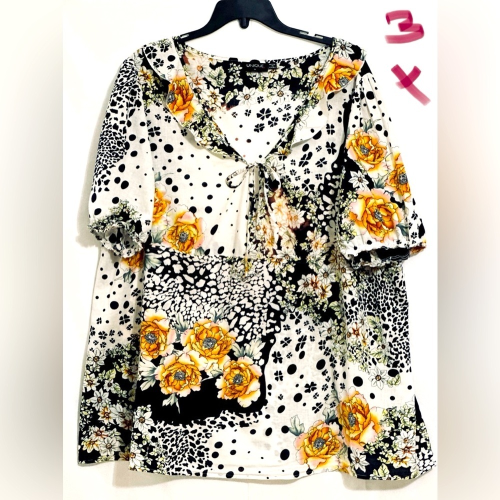 LADIES WHITE RUFFLED TOP WITH BLK POLKA DOTS & ORANGE FLOWERS